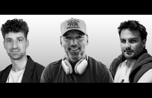 Black and white portrait of three men from the chest up against a light background.