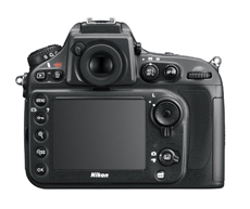 The back of a black Nikon digital single-lens reflex camera showing the LCD screen and control buttons.