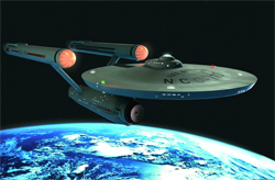 A large grey starship with glowing orange engines flying above a blue and white planet in space.