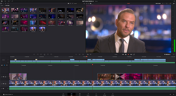 Video editing software interface with a man in a suit on the preview monitor and various clips in the media bin.