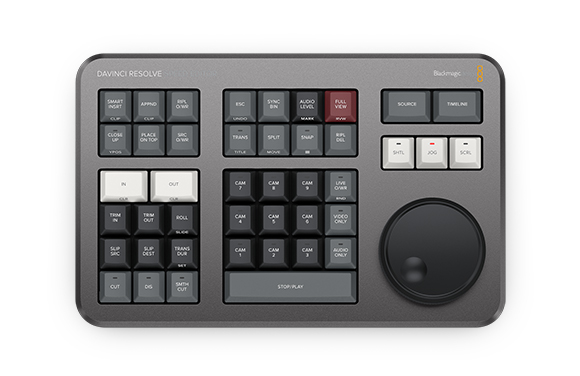 A dark gray DaVinci Resolve Speed Editor with various buttons, keys, and a large jog dial.