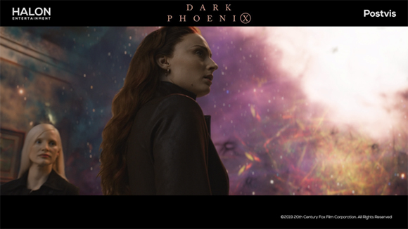 A woman with long red hair looks toward a bright light in a cosmic nebula background.