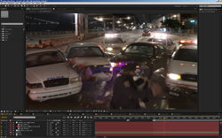 Video editing software showing a nighttime scene of police cars and officers on a city street.