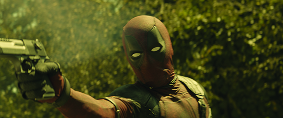 A person in a red and black masked suit points a handgun toward the left.