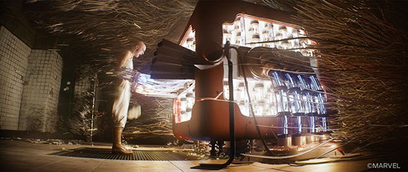 A man in white clothing stands next to a large, glowing machine filled with glass canisters.
