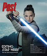 Rey from Star Wars holding a glowing blue lightsaber with a rocky coastline in the background.