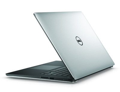 A silver Dell laptop shown from a rear angle, partially open on a white surface.