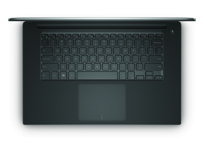A dark gray laptop viewed from directly above, showing the keyboard and trackpad.