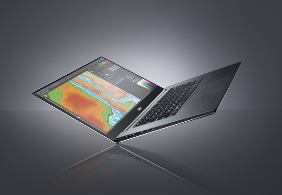 A dark gray laptop with two screens connected by a hinge, displayed against a gray gradient background.