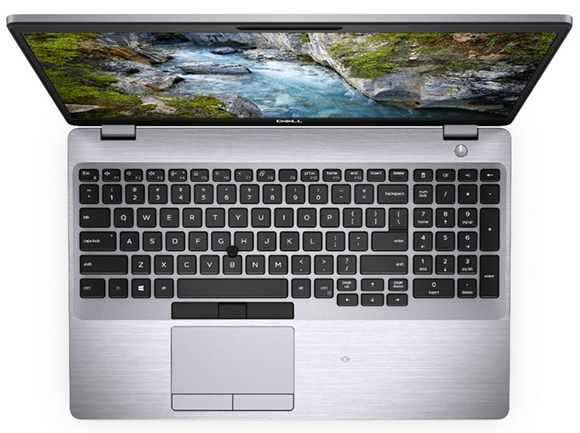 Open Dell laptop displaying a scenic river landscape on its screen, with a full keyboard and trackpad visible.