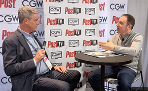 Two men sit at a small round table in front of a backdrop with CGW and Post TV logos.