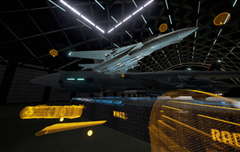 A white jet aircraft positioned inside a dark hangar under bright, linear overhead lights.