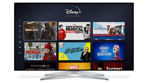 A television screen showing various Disney+ Originals tiles including The Mandalorian and High School Musical.