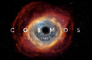 A glowing orange and blue nebula resembling a human eye against a starry black background.