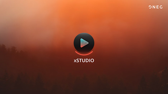xSTUDIO logo with a play button icon centered over a misty, orange-tinted forest landscape.
