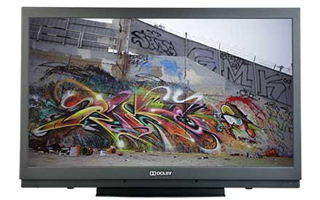 A flat-screen television showing a vibrant, multicolored graffiti mural on a large concrete wall.