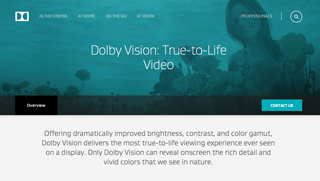 Webpage for Dolby Vision featuring a teal background with a woman's silhouette and text about true-to-life video.