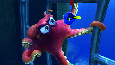 A large red octopus with big eyes clings to a metal structure next to a small blue fish.
