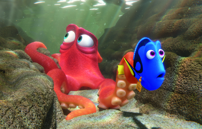A red animated octopus looks up while a blue animated fish swims beside it on a rocky seabed.