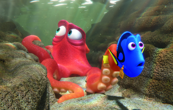 An animated red octopus looks up while a blue tang fish swims beside it on a rocky seabed.