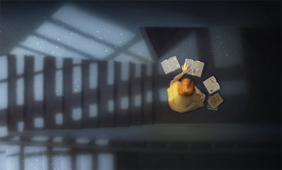 Top-down view of a person in a yellow shirt reading several papers spread out in a beam of light.