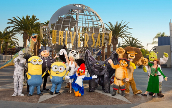 Various Universal Studios characters, including Minions and Toothless, posing in front of the Universal globe.