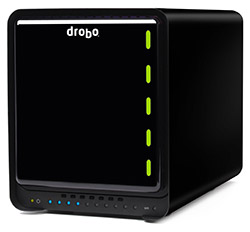 A black cubic Drobo storage device with a dark front panel and green status lights.