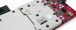Close-up view of an AMD FirePro graphics card showing the silver heat sink and red circuit board components.