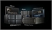 A collection of server racks, storage arrays, and hardware components against a dark background.