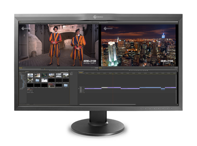 A wide computer monitor showing a video editing interface with two video windows and a timeline below.