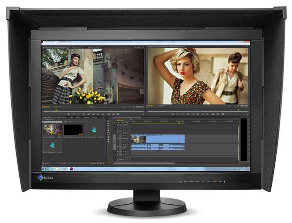 A black Eizo monitor with a hood displaying video editing software with two video clips and an audio timeline.