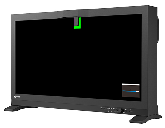 A large black widescreen computer monitor with a small green light at the top center.