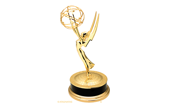 A gold Emmy Award trophy featuring a winged woman holding an atom symbol on a circular base.