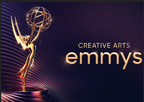 A gold Emmy award statue stands next to the text 'CREATIVE ARTS emmys' on a purple textured background.