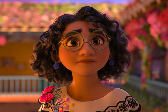 Animated girl with dark curly hair and green round glasses looking upward with a surprised expression.
