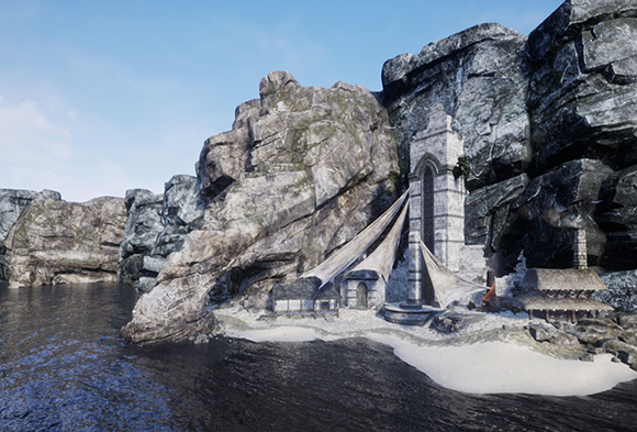 A tall stone tower and small structures built into a rocky cliffside on a sandy beach by dark water.