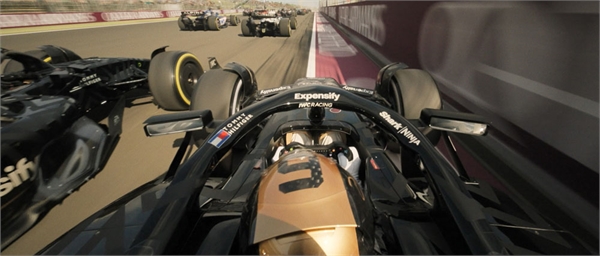 First-person perspective from inside a black Formula 1 racing car driving on a track among other cars.