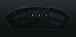A dark, curved dashboard featuring various glowing blue buttons, dials, and digital displays.