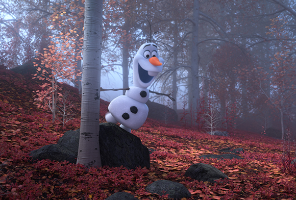 A smiling snowman stands in a misty forest filled with red autumn leaves and slender trees.