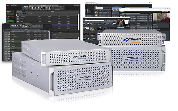 Several white Facilis storage server units stacked in the foreground before computer screens showing software.