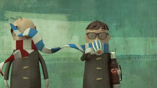 Two animated figures in coats; one has a blue and white scarf wrapped around their head.