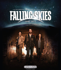 Three people stand in a dark tunnel under a starry sky with the title Falling Skies and June 2011.