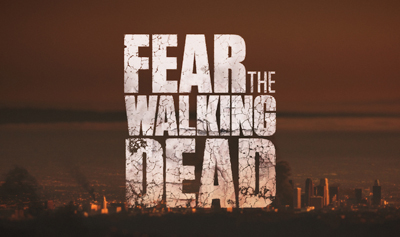 The title Fear the Walking Dead in large, distressed white letters against a dark, hazy landscape.