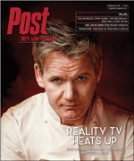 Close-up portrait of a man in a chef's uniform, looking directly at the camera.