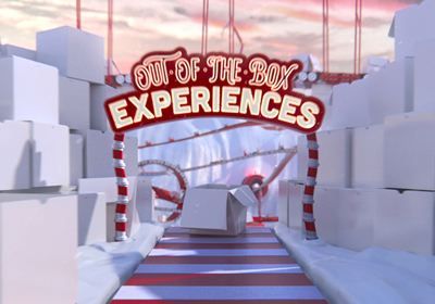 Red and white logo reading 'Out of the Box Experiences' set against a landscape of white blocks and tracks.