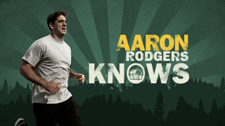 A man in a white t-shirt runs against a green sunburst background with text reading Aaron Rodgers Knows.