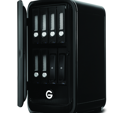 A black rectangular network attached storage device with an open front panel revealing four drive bays.
