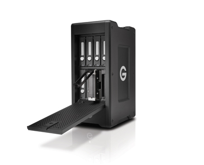 A black vertical external hard drive enclosure with an open loading tray and several drive bays.