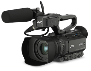 A black JVC professional video camera equipped with a large shotgun microphone and a lens hood.