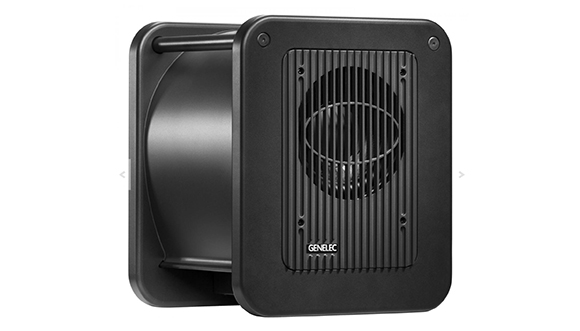 A black Genelec studio monitor with a square front grille and a cylindrical rear body.